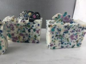 White soap with colorful pieces, confetti style with chameleon embed resembling Gaudí’s