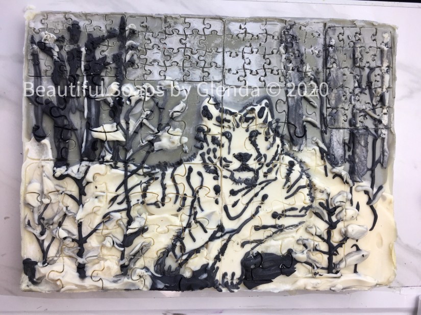 White and black soap, with bengal tiger in slab mold, puzzle soap
